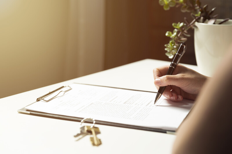 Buy to Let A customer signing a buy-to-let contract