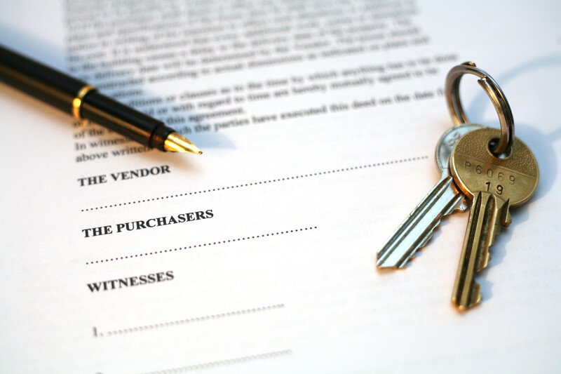 Conveyancing Some conveyancing papers, a pen, and a key