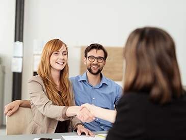 Mortgage Broker Durham Two women shaking hands