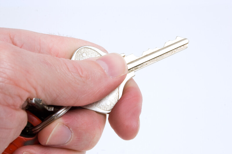 First Time Buyer A hand holding a key