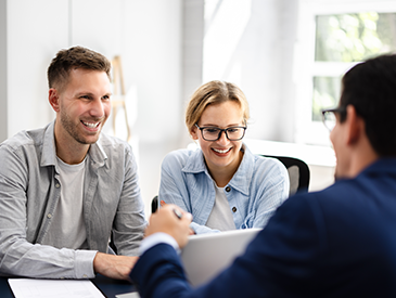 Mortgage Broker Leeds A mortgage adviser is speaking with his clients